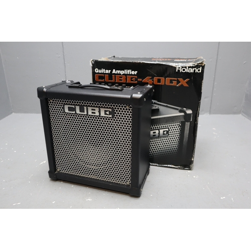 826 - A Boxed Roland Cube 40GX Guitar Amplifier, With Instructions. Powers On When Tested