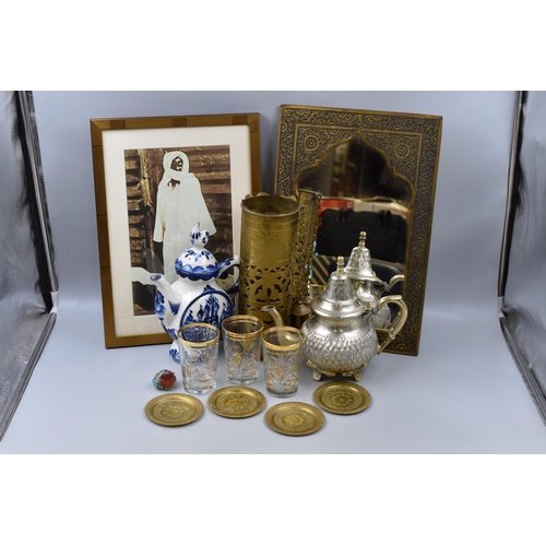 418 - A Selection of Moroccan Items To Include Brass Wall Mirror, Coffee Set (Three Glasses, Coasters, And... 