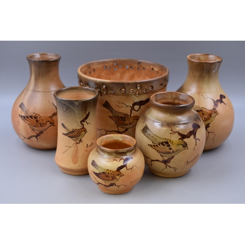 386 - Collection of Arnaldo pottery, six in total, five vase's and a planter