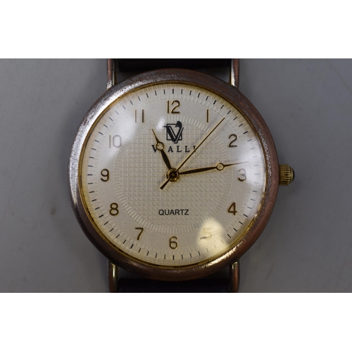 130 - A Vialli Gents Quartz Watch With Leather Strap. Working