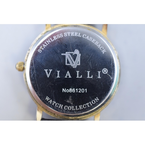 130 - A Vialli Gents Quartz Watch With Leather Strap. Working