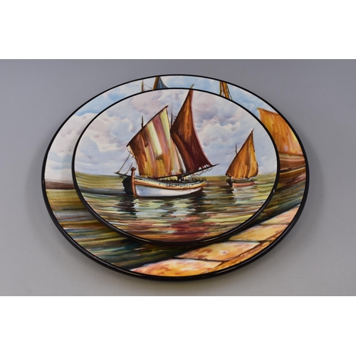 533 - 2 Spanish wall plates depicting boating scenes 1 plate is (15