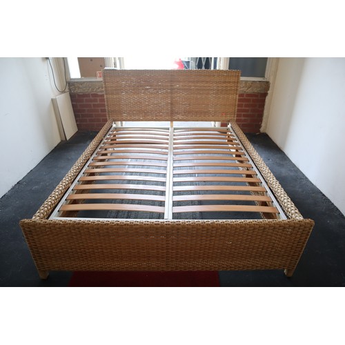 555 - Rattan king sized bed (59