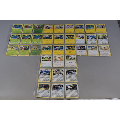 203 - Ten Sheets of Assorted Modern Pokemon Cards