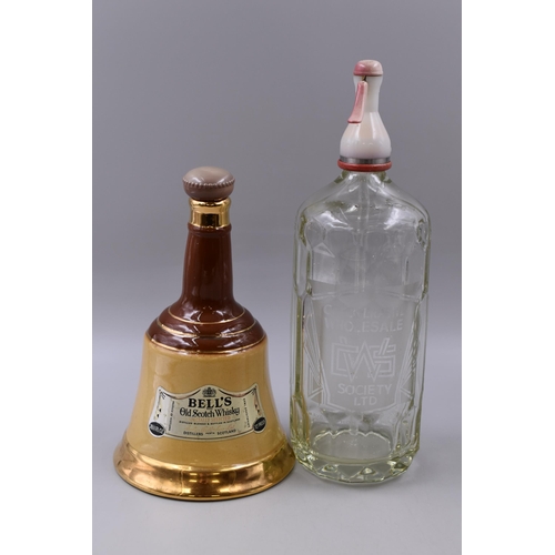 792 - Co-Operative Wholesale Society Ltd Soda Syphon and a Empty Bells Whisky Decanter