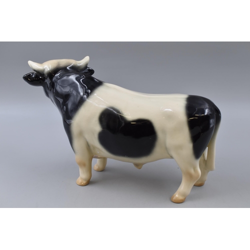 220 - A Coopercraft Friesian Cow Figure, Approx 16cm Tall