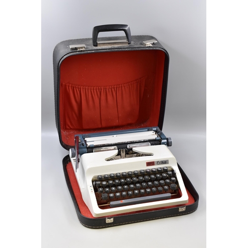 835 - A Daro Erika Typewriter, With Carry Case