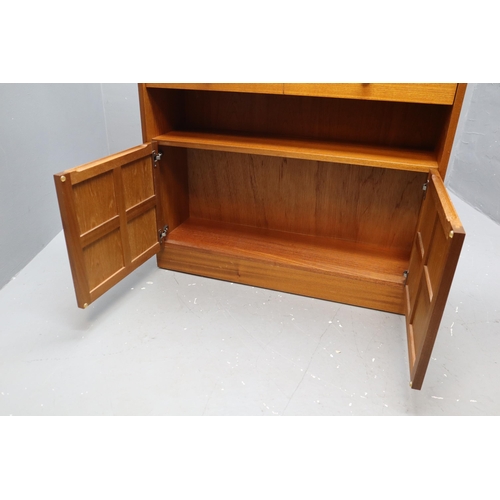 688 - Parker Knoll unit with single drawer, single cupboard and three shelves (48