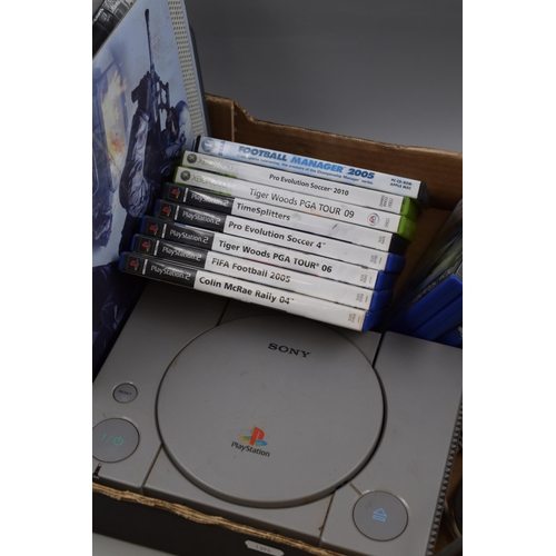 844 - Sony Playstation, Controller and Leads with a XBox 360 and a Selection of Games