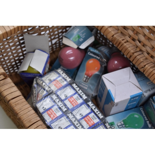 865 - A Selection of Various Coloured Bayonet Cap Light Bulbs, in Wicker Basket