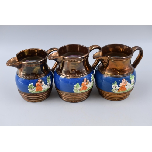 243 - Copper Lusterware 5 small jugs and 1 small cup