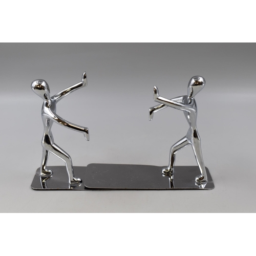 295 - Pair of Stainless Steel Humanoid Bookends