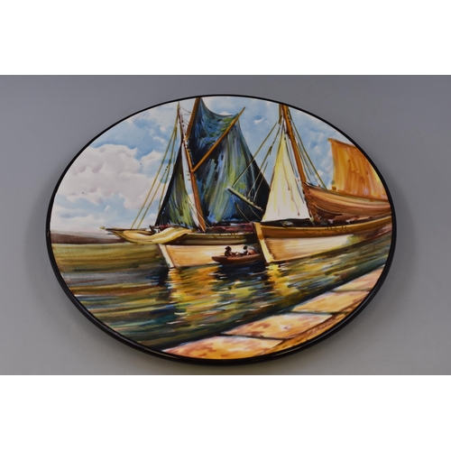 533 - 2 Spanish wall plates depicting boating scenes 1 plate is (15