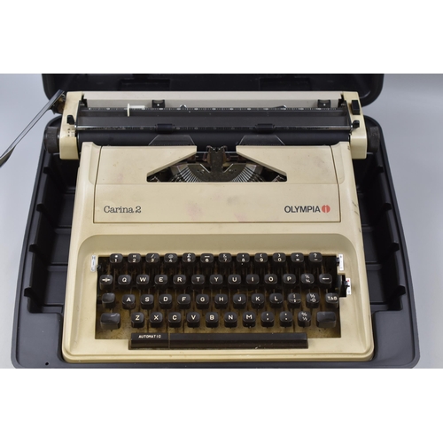 639 - An Olympia Carina 2 Automatic Typewriter, With Instructions and Carry Case