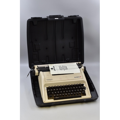 639 - An Olympia Carina 2 Automatic Typewriter, With Instructions and Carry Case