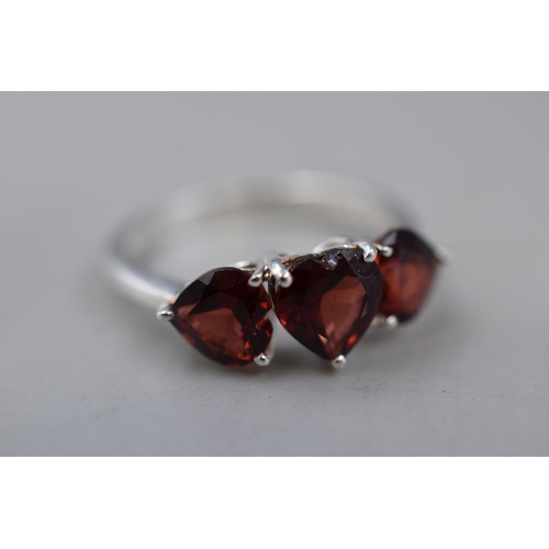 34 - A 925. Silver Trio Red Stoned Ring, Size N/O