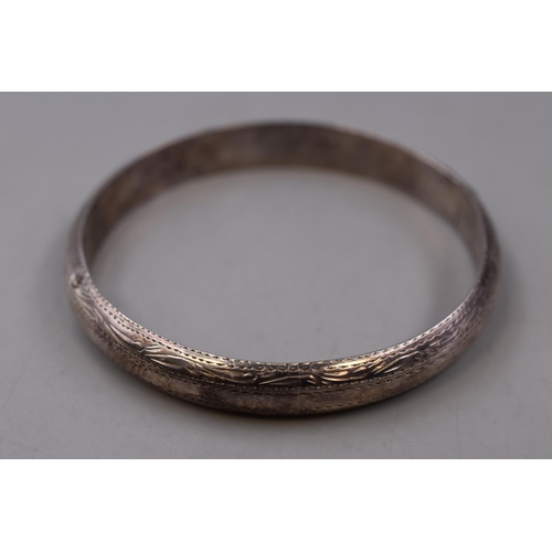 44 - A 925. Silver Etched Bangle