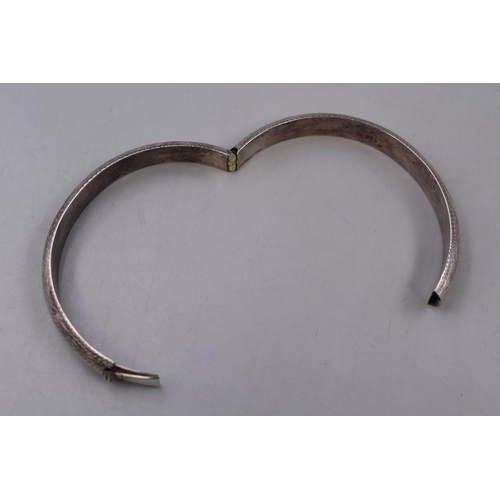 44 - A 925. Silver Etched Bangle