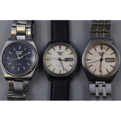 134 - Three Seiko 5 Automatic Gents Day/Date Watches (Black Dial and Two Champagne Dials), All Working