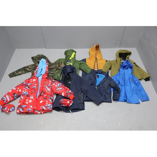 863 - A Selection of Eight Childrens Winter Coats/Jackets To Include Marvel, Peter Storm, Regatta, Columbi... 