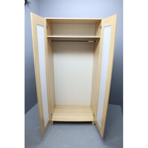 669 - Modern pine wardrobe with single shelf and rail with corrugated door windows (71