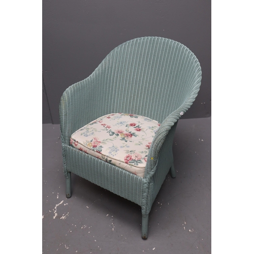 676 - Lloyd Loom style wicker arm chair, 28