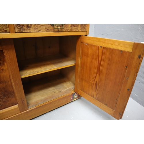 722 - Pine wash stand with two drawers and two cupboards on casters with brass fittings with a heavy marbl... 