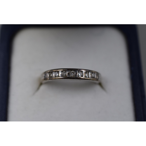 13 - An Unmarked 9ct White Gold Diamond Stoned Ring In Presentation Box, Size M. Misshapen