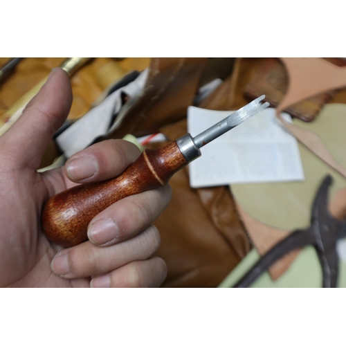 862 - A Selection of Leather Working Samples and Tools. Includes Various Cuts of Leather and Tools