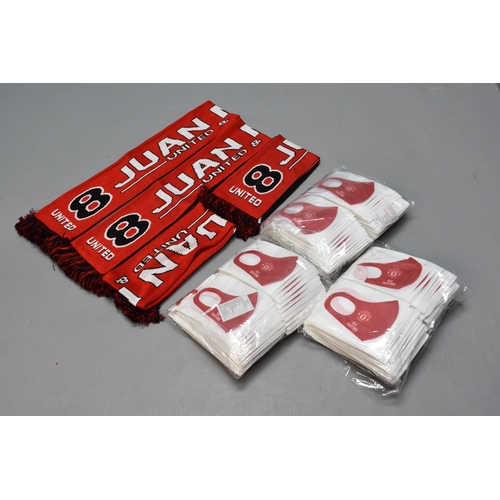 802 - A Large Selection of Manchester United Face Masks, With Four Manchester United Scarves