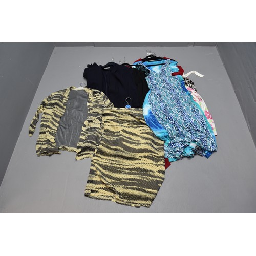 830 - A Mixed Lot of Ladies Quality Clothing, Some Still With Tags. To Include Tops, Jackets, and More. Ap... 