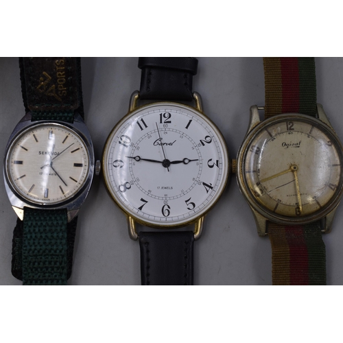 100 - Three Mechanical Watches To Include Sekonda 17 Jewels (Working), Carvel 17 Jewels (Working), And Ogi... 