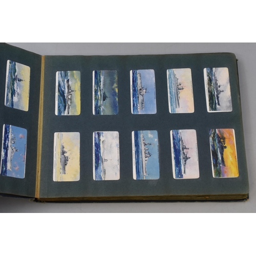 200 - The Wills Cigarette Card Album containing a Selection of Players and Wills Cigarette Cards