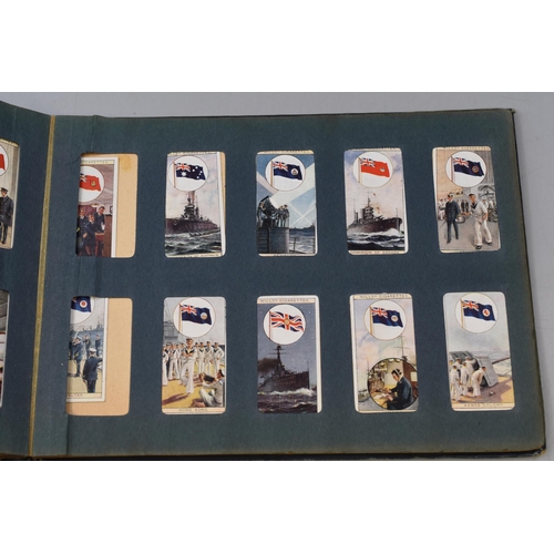 200 - The Wills Cigarette Card Album containing a Selection of Players and Wills Cigarette Cards