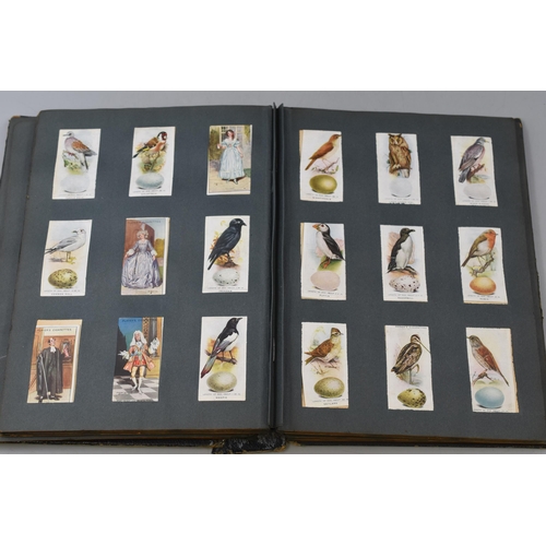 201 - Vintage Album containing a Selection of Mainly Churchman's and Players Cigarette Cards including Mil... 