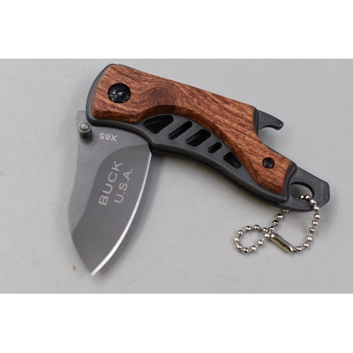 209 - A Buck x65 Pocket Knife, Approx 15cm Long