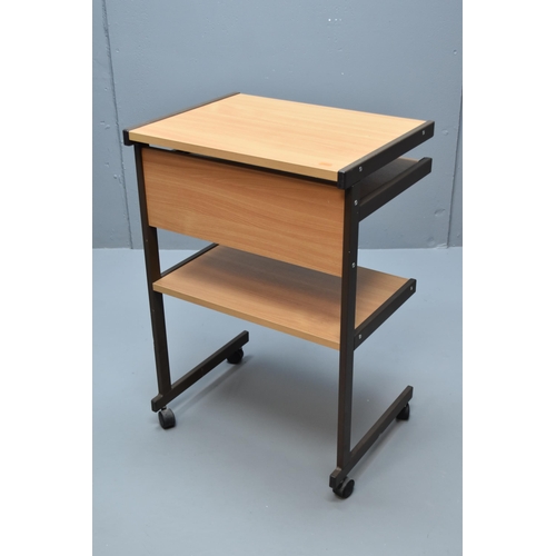 423 - Three tier wooden desk/table with pullout shelf its also on wheels to move around (31