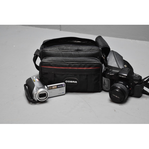 529 - Minolta dynax 7xi camera and a panasonic video camera in carry case