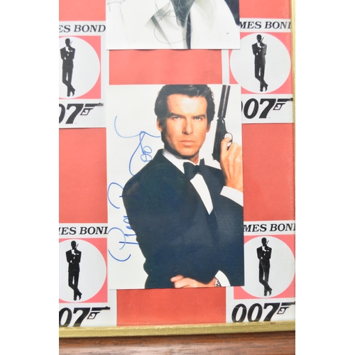 375 - A Framed and Glazed James Bond Facsimile Signed Presentation (Sean Connery - Pierce Brosnan), Approx... 