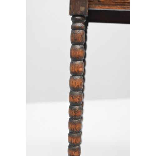 582 - Small wooden console table with twisted wooden legs (24