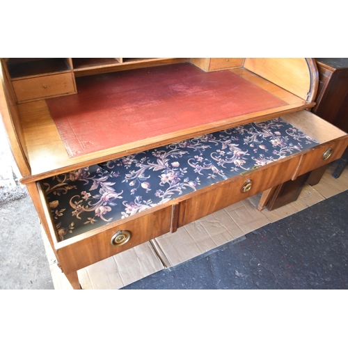 642 - Large light oak writing desk with seven front drawers with two internal drawers in the fold down top... 