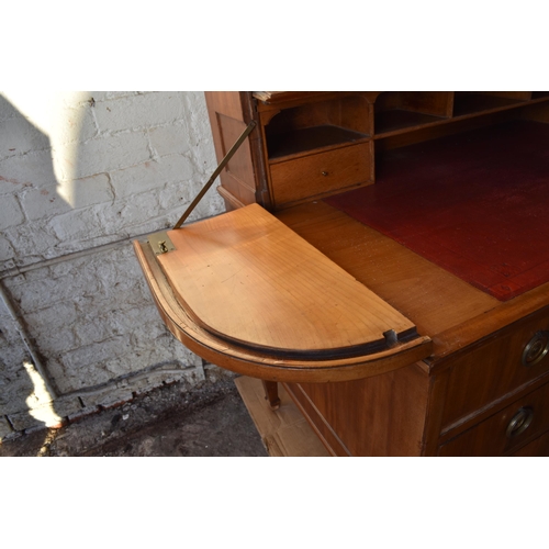 642 - Large light oak writing desk with seven front drawers with two internal drawers in the fold down top... 