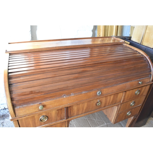 642 - Large light oak writing desk with seven front drawers with two internal drawers in the fold down top... 