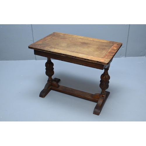 583 - Small brown wooden side table with acorn legs (21