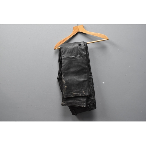 584 - A Leather JTS Motorcycle Jacket (Size 50), With A Pair of Leather Motorcycle Trousers (Size L)