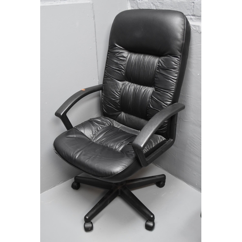 585 - Black leather office chair, works as intended