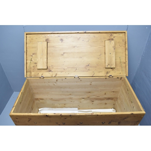 591 - Vintage hard wooden chest with casters (27