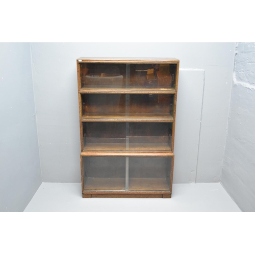 592 - Glazed oak sectional barristers bookcase/display unit (53