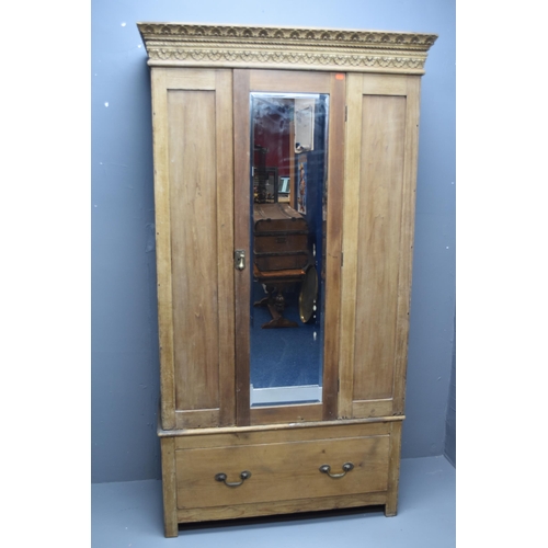 596 - Vintage two piece wardrobe with crown and mirrored single door and single base drawer (79