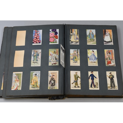 201 - Vintage Album containing a Selection of Mainly Churchman's and Players Cigarette Cards including Mil... 